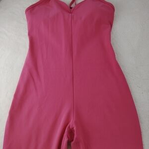 Alo Yoga Suns Out OnesieAlosoft Suns Out Jumpsuit sz small pink summer crush l